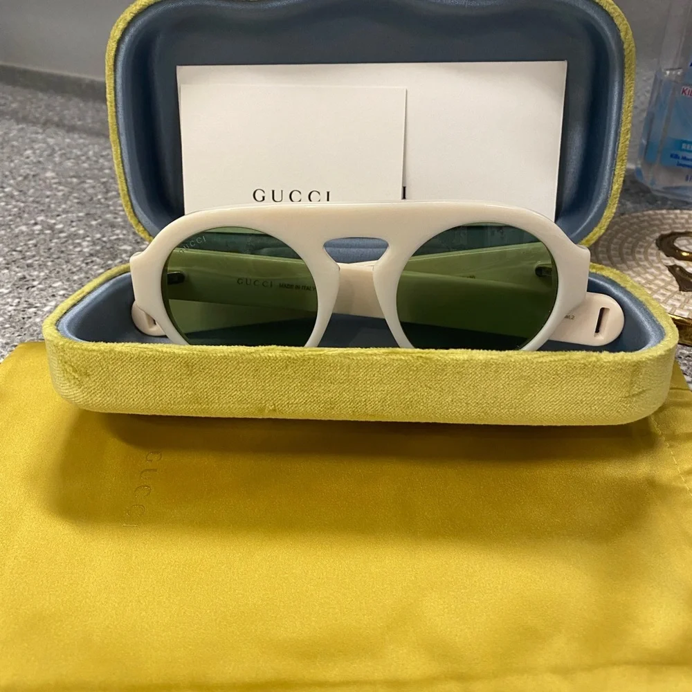 Unisex sunglasses, Brand new comes with case, identification card. - Picture 3 of 5